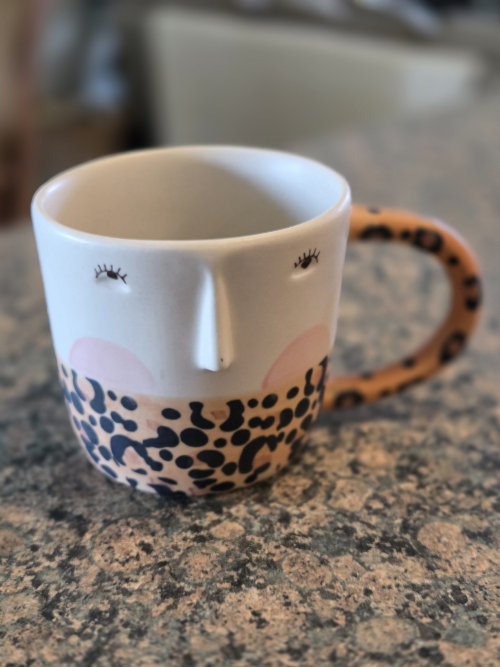 Anthropologie Sculpted Face Mug with Pink and Black Leopard Handle